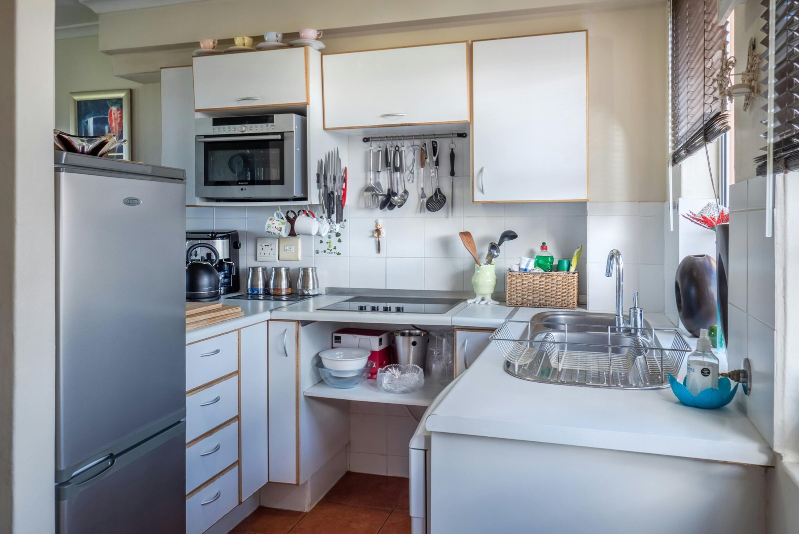 Sophisticated kitchen interior with modern appliances, wooden accents, and functional design.