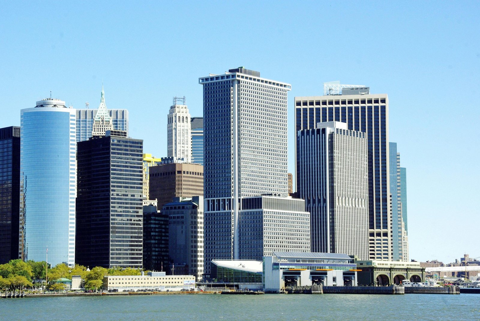 View of New York City's iconic waterfront skyline with modern skyscrapers.